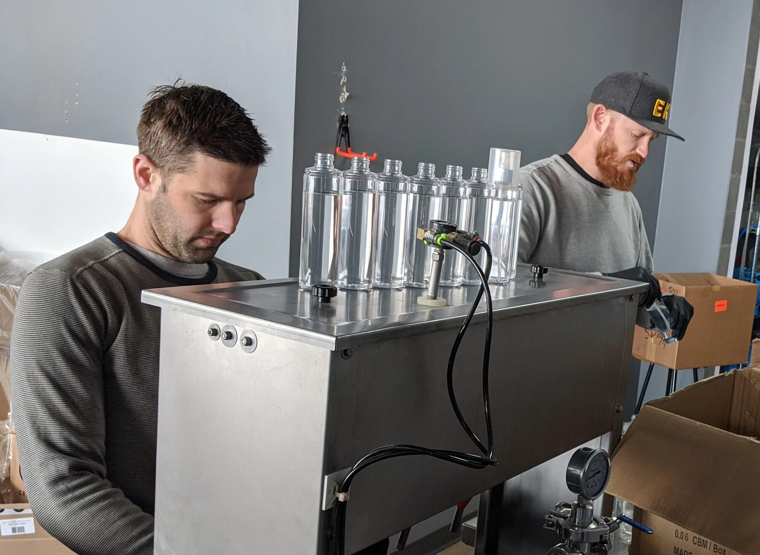 Eastern Kille Distillery employees making hand sanitizer